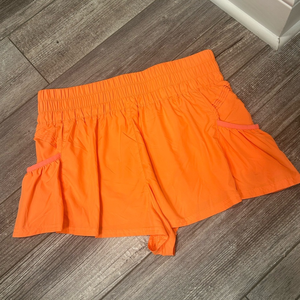 FP Movement by Free People Vibrant Orange Athletic Shorts